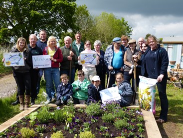 Pupils of St.Marys CofE Aided Primary School, Viridor staff and the Stopham Plotters at the allotment site